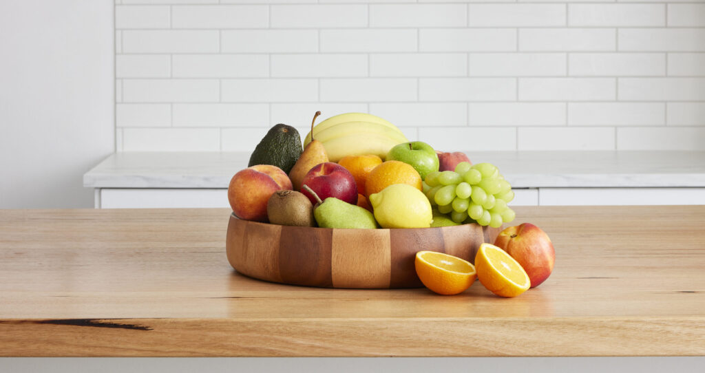 Office fruit bowl with seasonal Autumn fruit